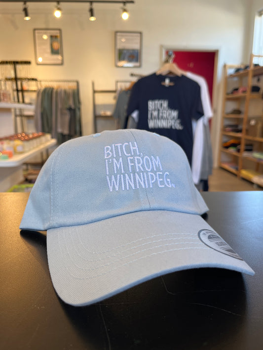Bitch, I'm From Winnipeg Dad Hat | White on Powder Blue